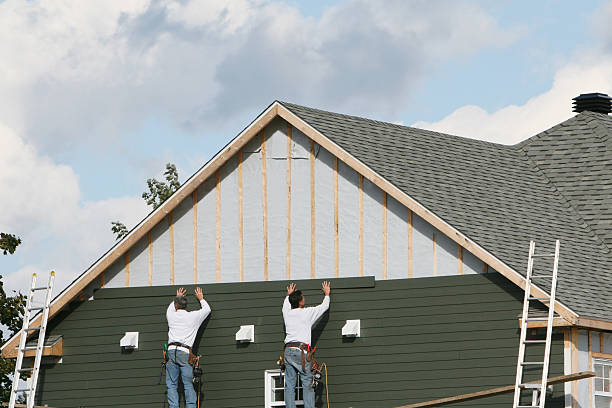 Professional Siding technician working in Newington, CT